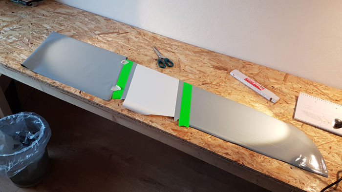 Folierungsarbeiten - graue Fläche zu der Flächenwurzel